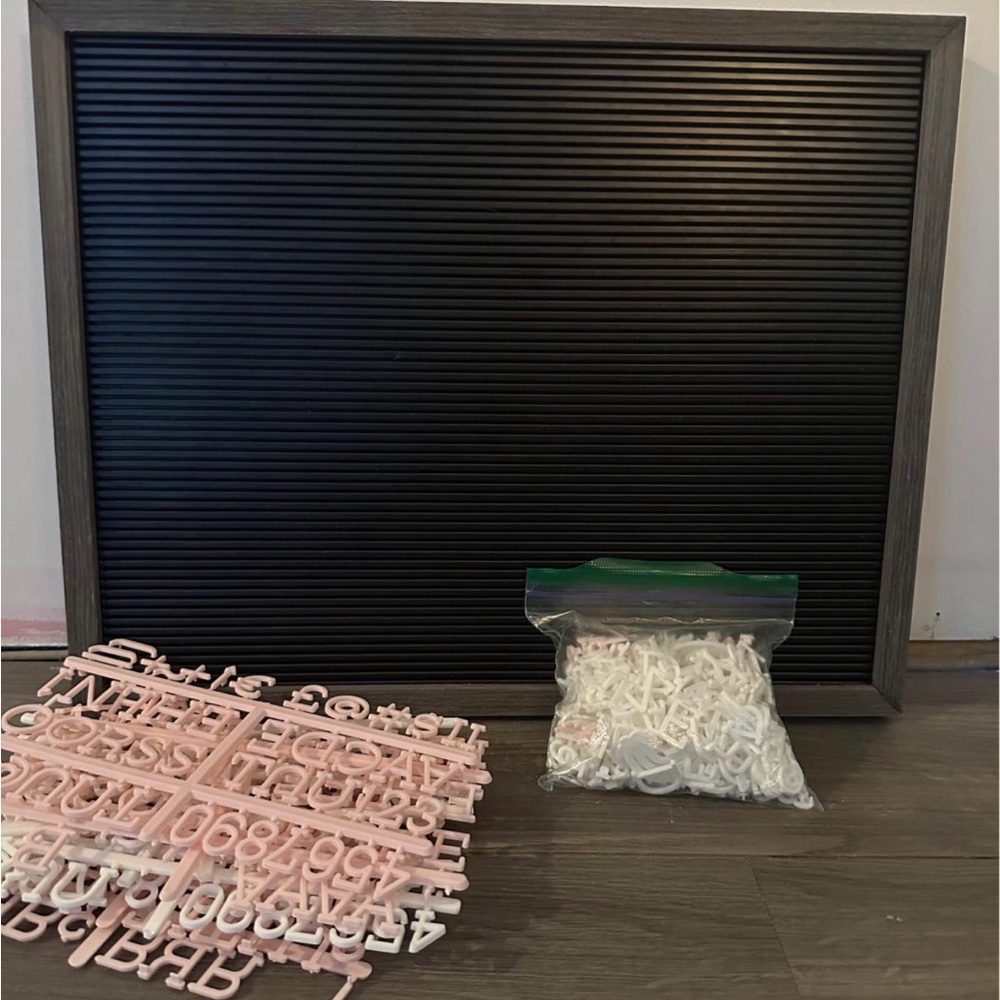 Black Letter Board with Pink and White Letters